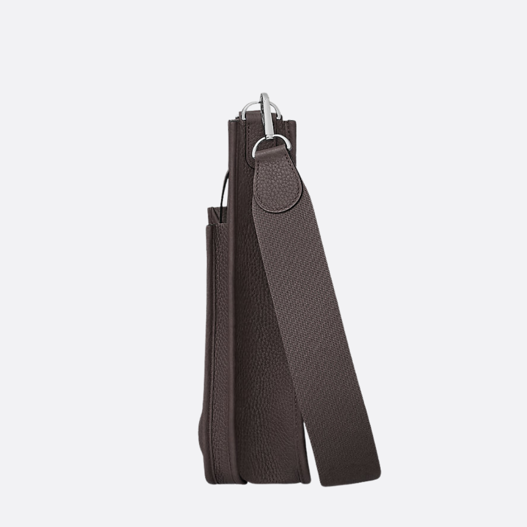 Buet crossbody-taske i perforeret læder til kvinder