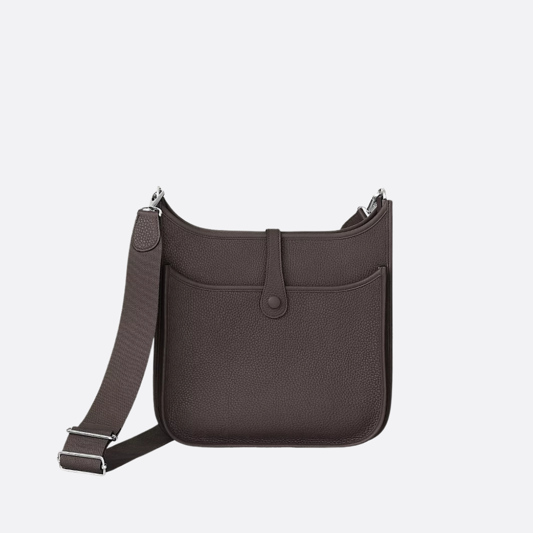 Buet crossbody-taske i perforeret læder til kvinder