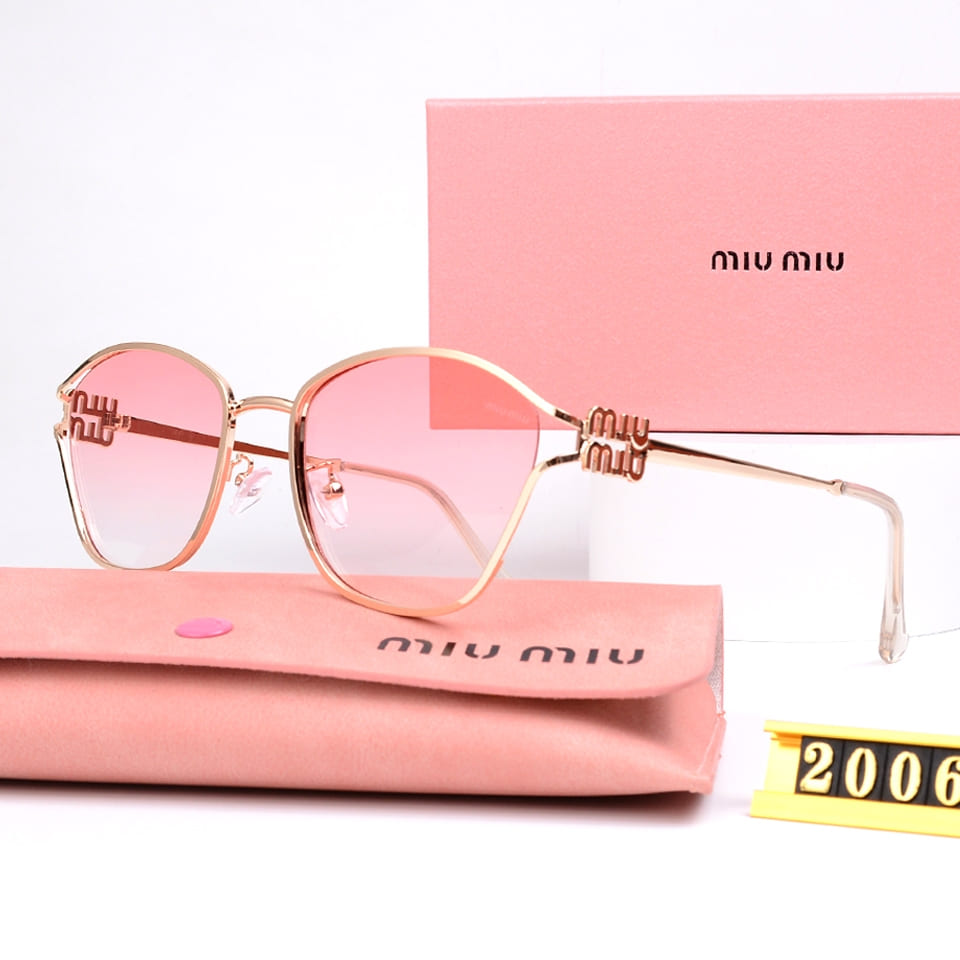 Solbriller med oval guldfarvet stel til kvinder