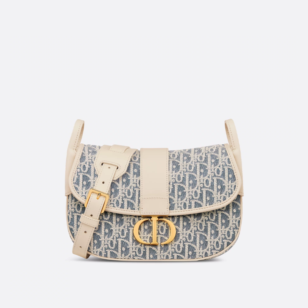 Crossbody-taske i jacquardlærred til kvinder med buet flap