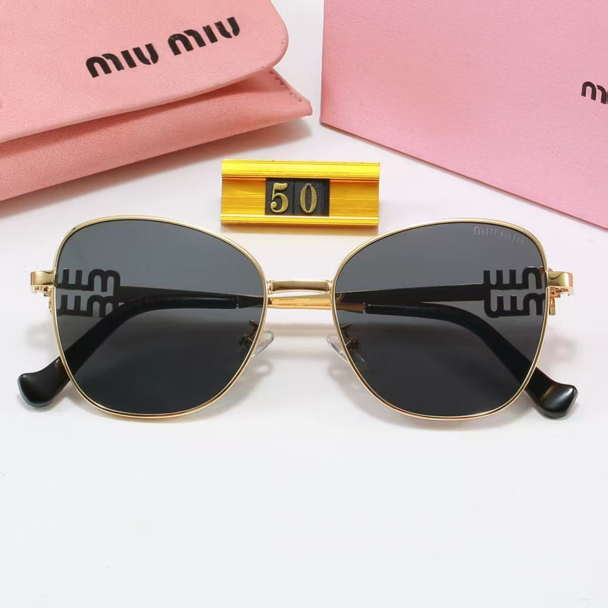 Lunettes de soleil rondes à monture fil métallique doré