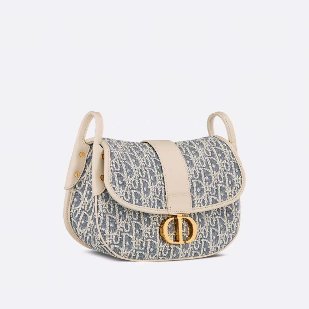 Crossbody-taske i jacquardlærred til kvinder med buet flap
