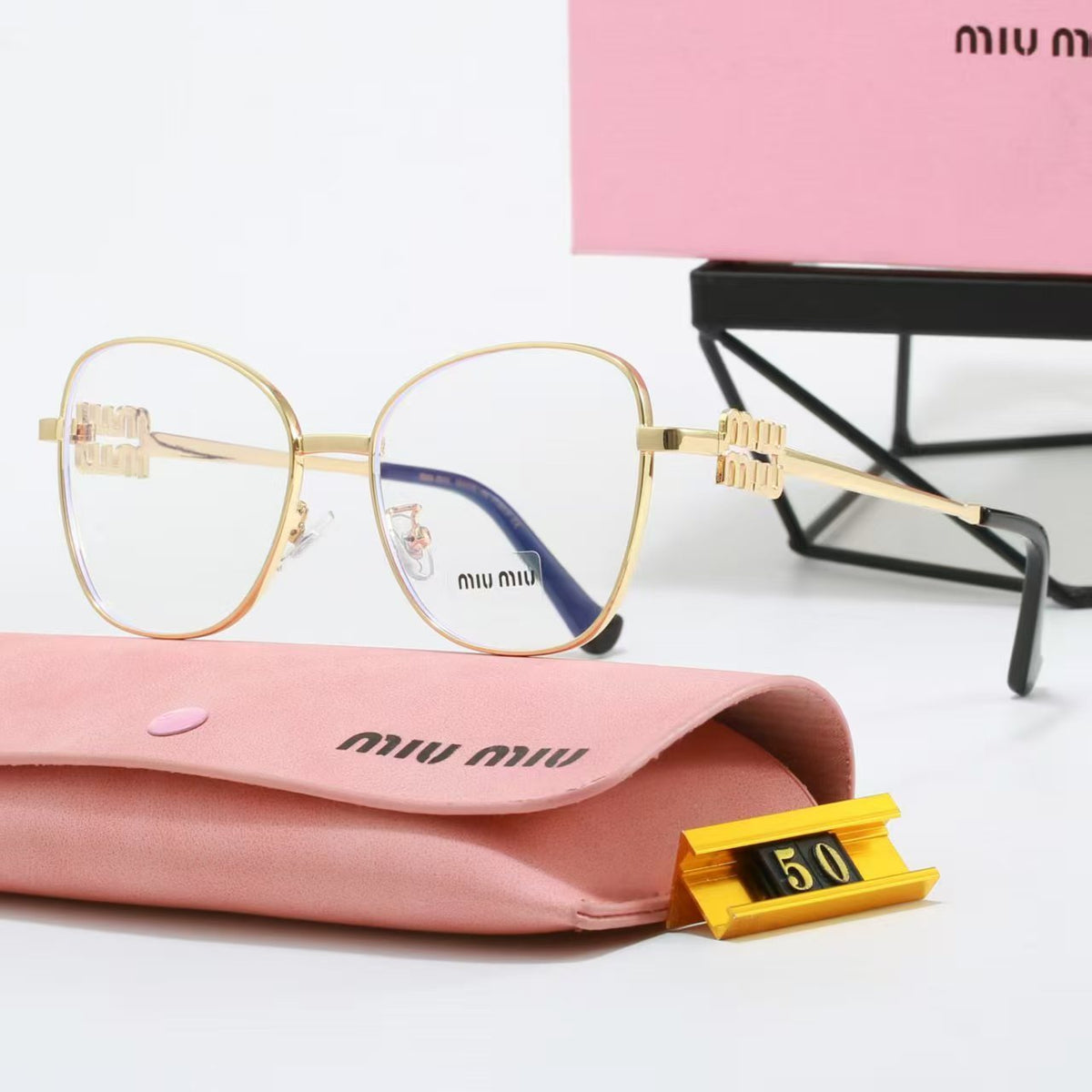 Lunettes de soleil rondes à monture fil métallique doré