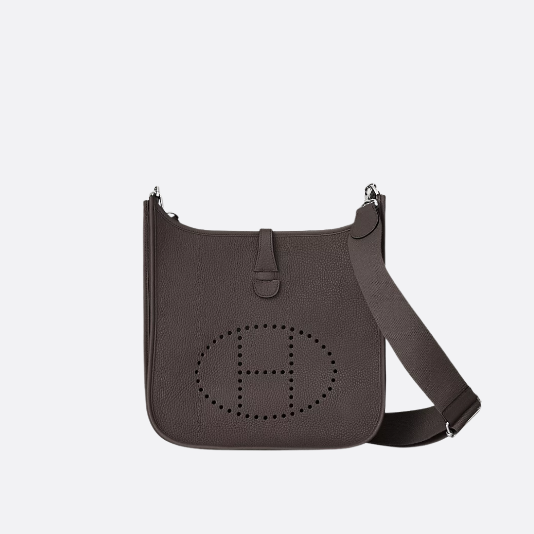 Buet crossbody-taske i perforeret læder til kvinder