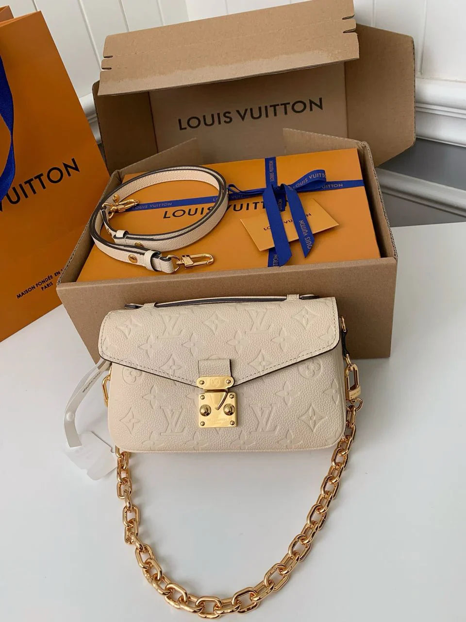 LV Pochette Métis East West