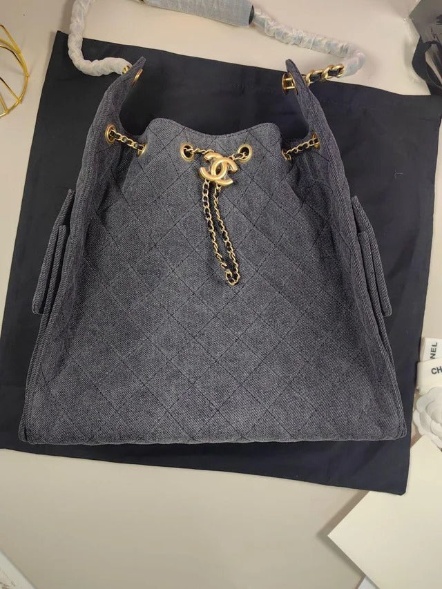 Women's Medium Quilted Leather Drawstring Bucket Bag